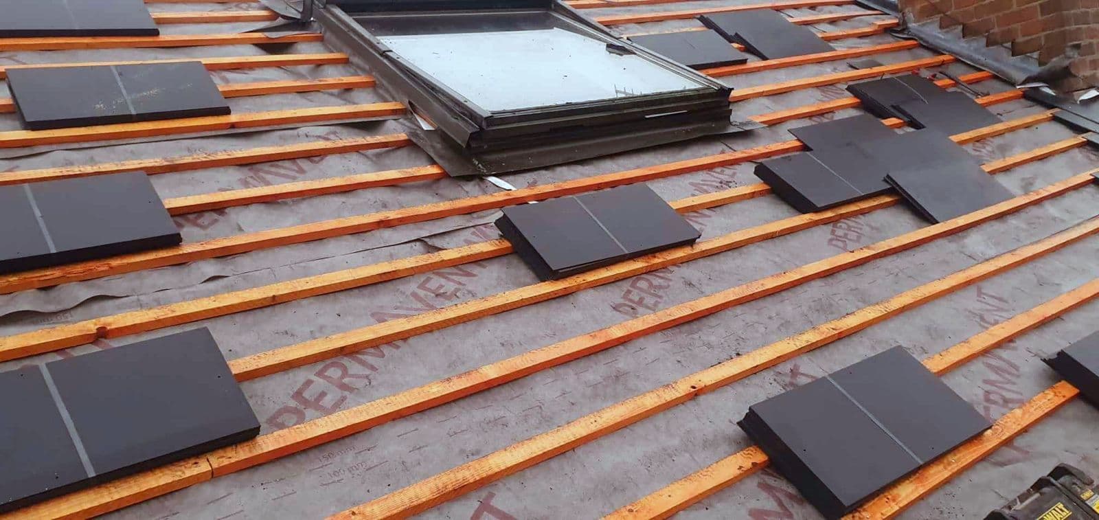 Insulation boards going down on a flat roof